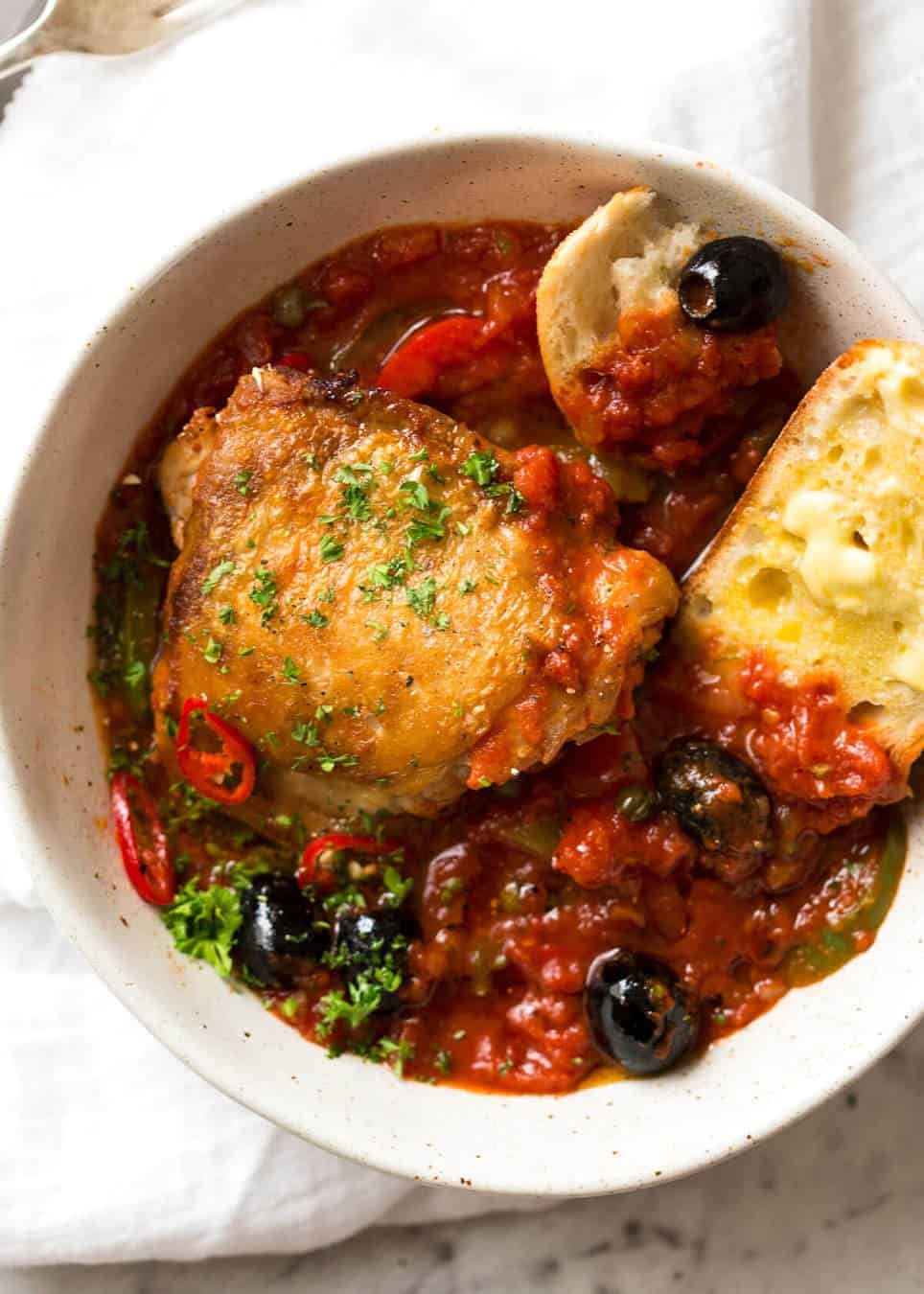 A hearty Italian Chicken Casserole with crispy chicken, capsicum / bell peppers, olives and capers. Sicilian style! staging.recipetineats.com