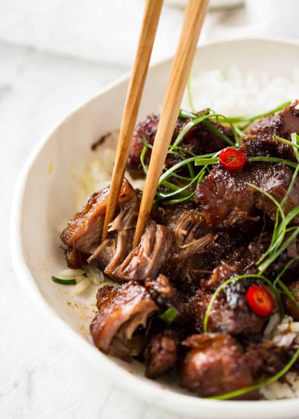 Vietnamese Caramel Pork is a simple, magical recipe - tender pork in a sweet savoury glaze and no hunting down unusual ingredients! staging.recipetineats.com