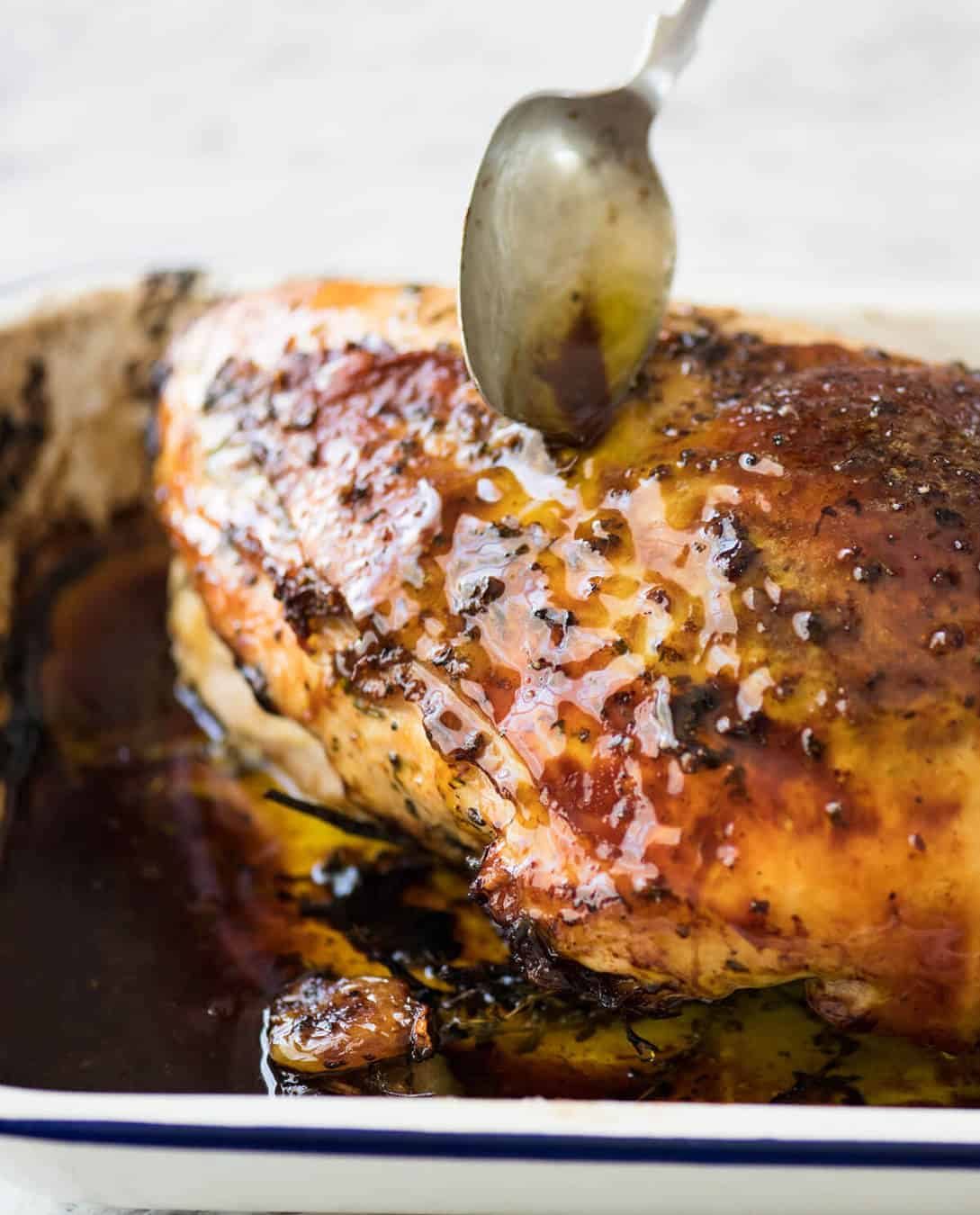 Garlic Herb Butter Roasted Turkey Breast with herb butter under the skin. Quick video tutorial provided. This is food so good, it will make you want to cry! staging.recipetineats.com
