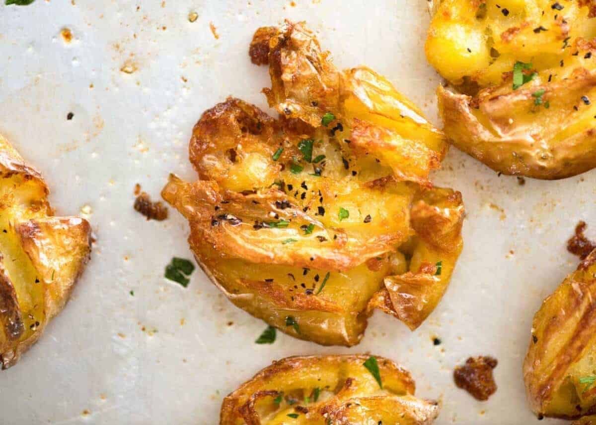 The best, buttery, golden, ultra crispy smashed potatoes you will ever have! staging.recipetineats.com