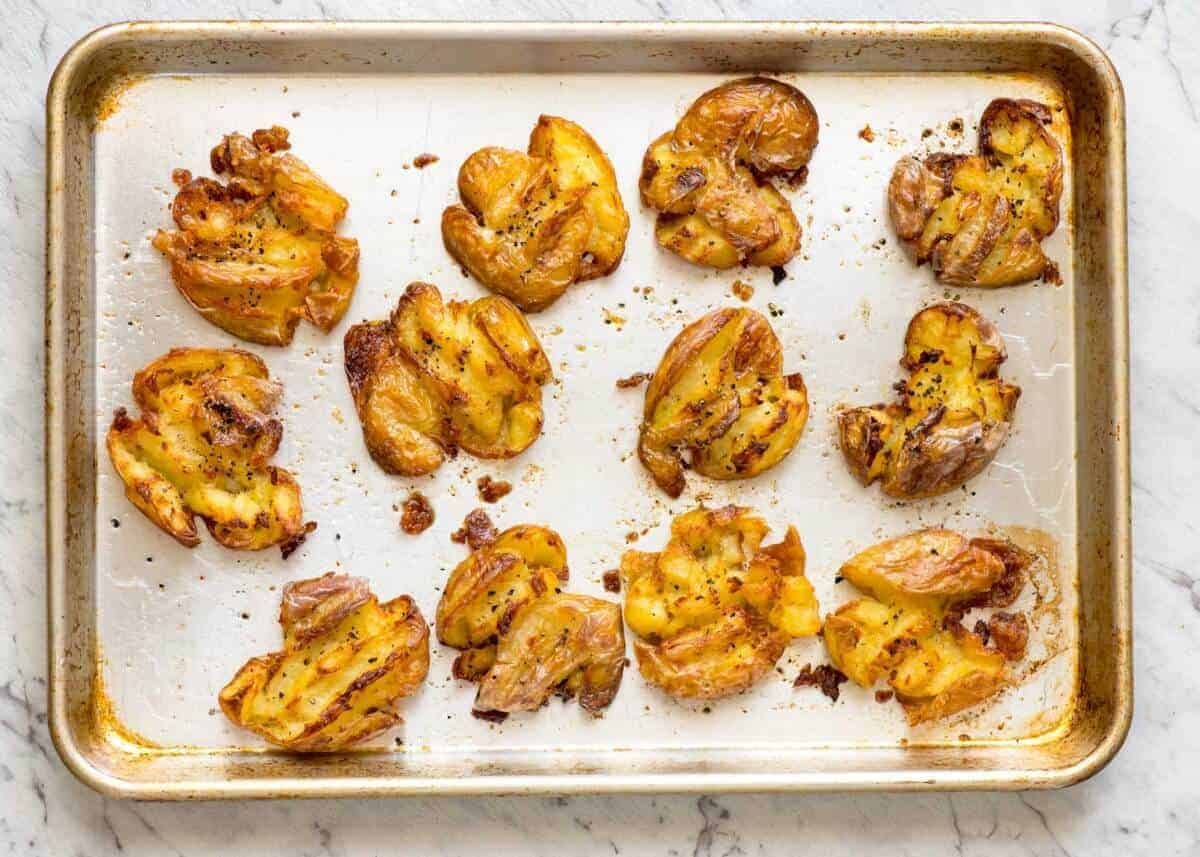 The best, buttery, golden, ultra crispy smashed potatoes you will ever have! staging.recipetineats.com