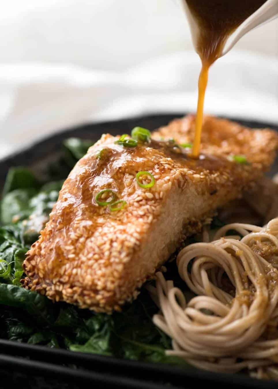Just roll the salmon in sesame seeds, drizzle with oil and bake! You'll be amazed how well the sesame adheres to the salmon and love how crispy this Sesame Salmon comes out!