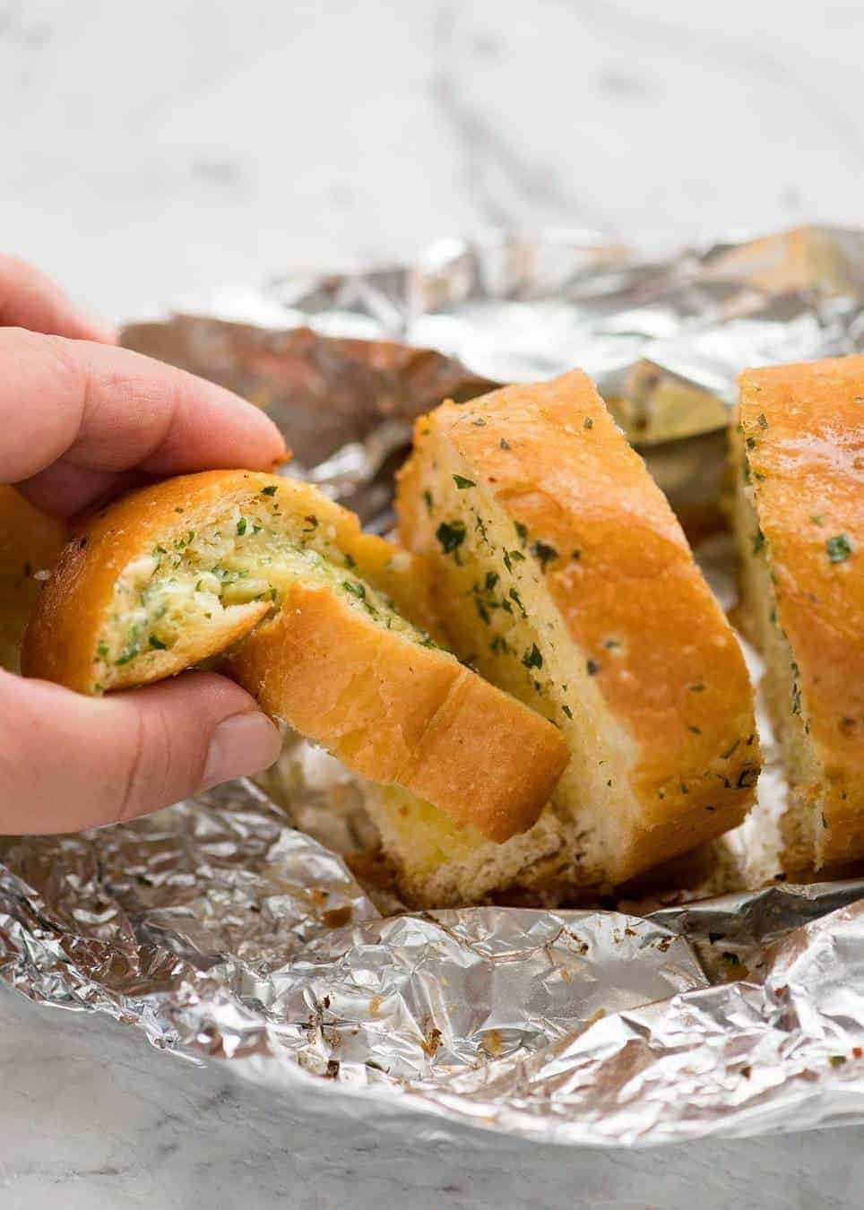 Better than Pizza Hut! For a truly religious Garlic Bread experience, skip the artisan bread and use a basic French stick. And no skimping on butter! staging.recipetineats.com