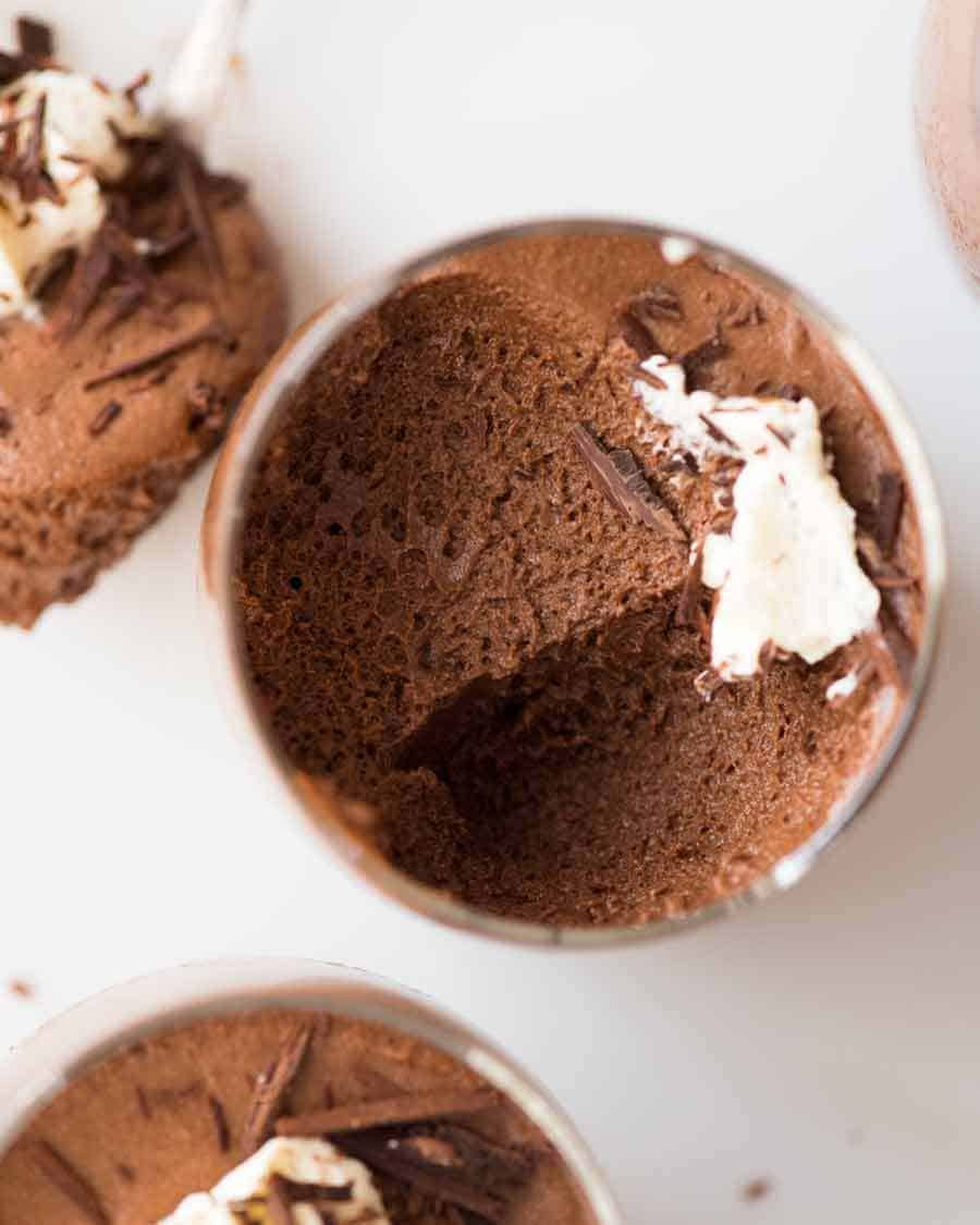 Overhead photo of Chocolate Mousse with a scoop taken out, showing how light and fluffy it is
