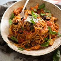 Sicilian Chicken Spaghetti in a rustic bowl, ready to be eaten