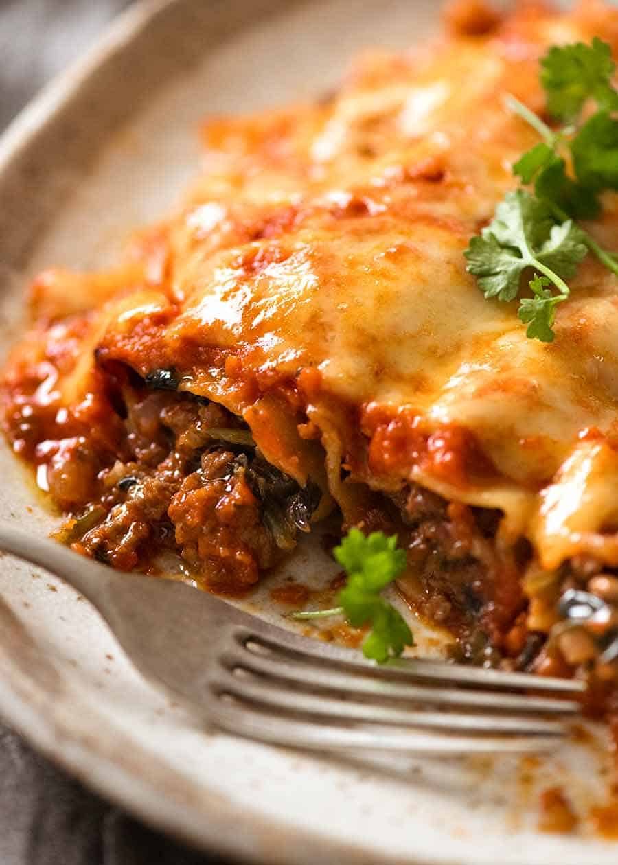 Close up of Spinach Beef Cannelloni on a plate, ready to be eaten