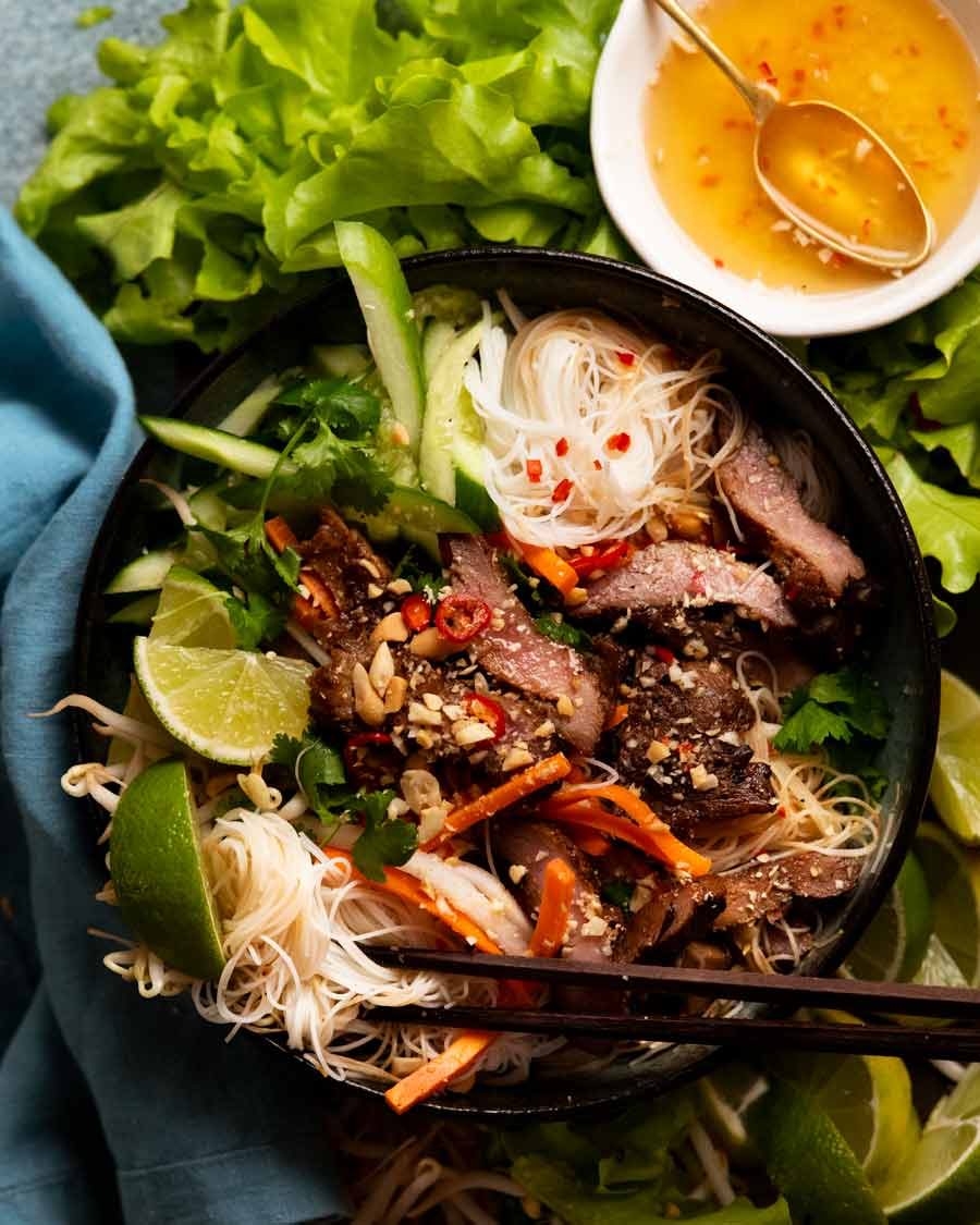 Vietnamese noodles with lemongrass pork (B&uacute;n thịt nướng) ready to be eaten